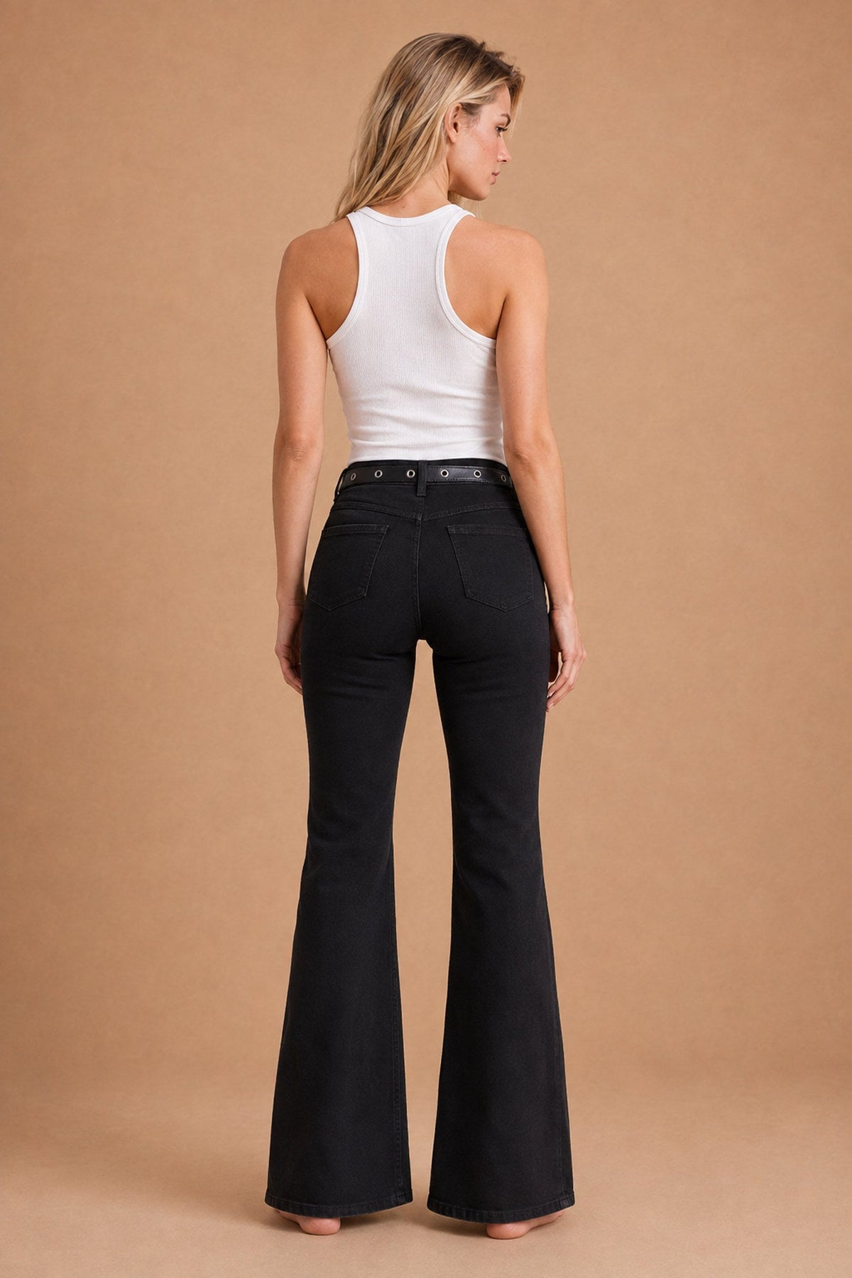 The Paula by Arisi, black high-rise flare jean, back view on model